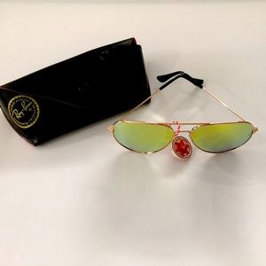Ray Ban gold framed sunglasses with yellow lenses